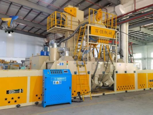 Máy phun bi băng tải con lăn có ưu điểm gì?