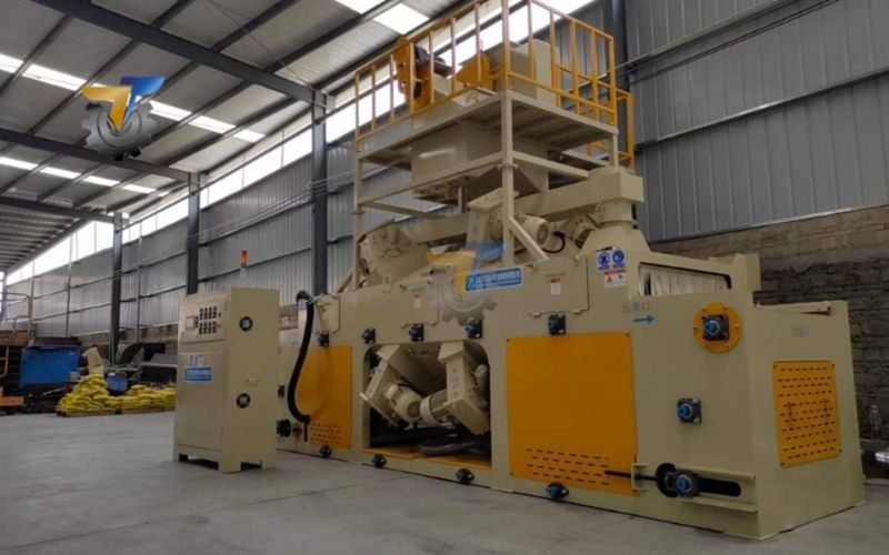 máy phun bi dạng băng tải bao nhiêu tiền